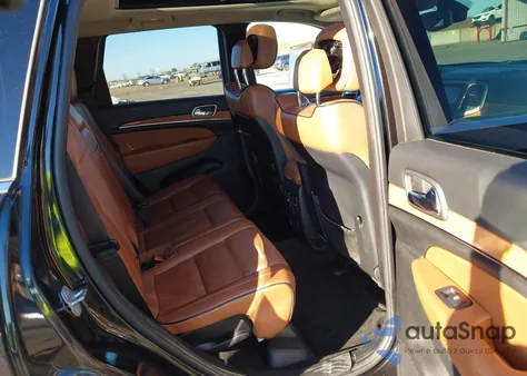 2012 Jeep Grand Cherokee Overland из США, поврежденный, VIN 1C4RJECG3CC281868